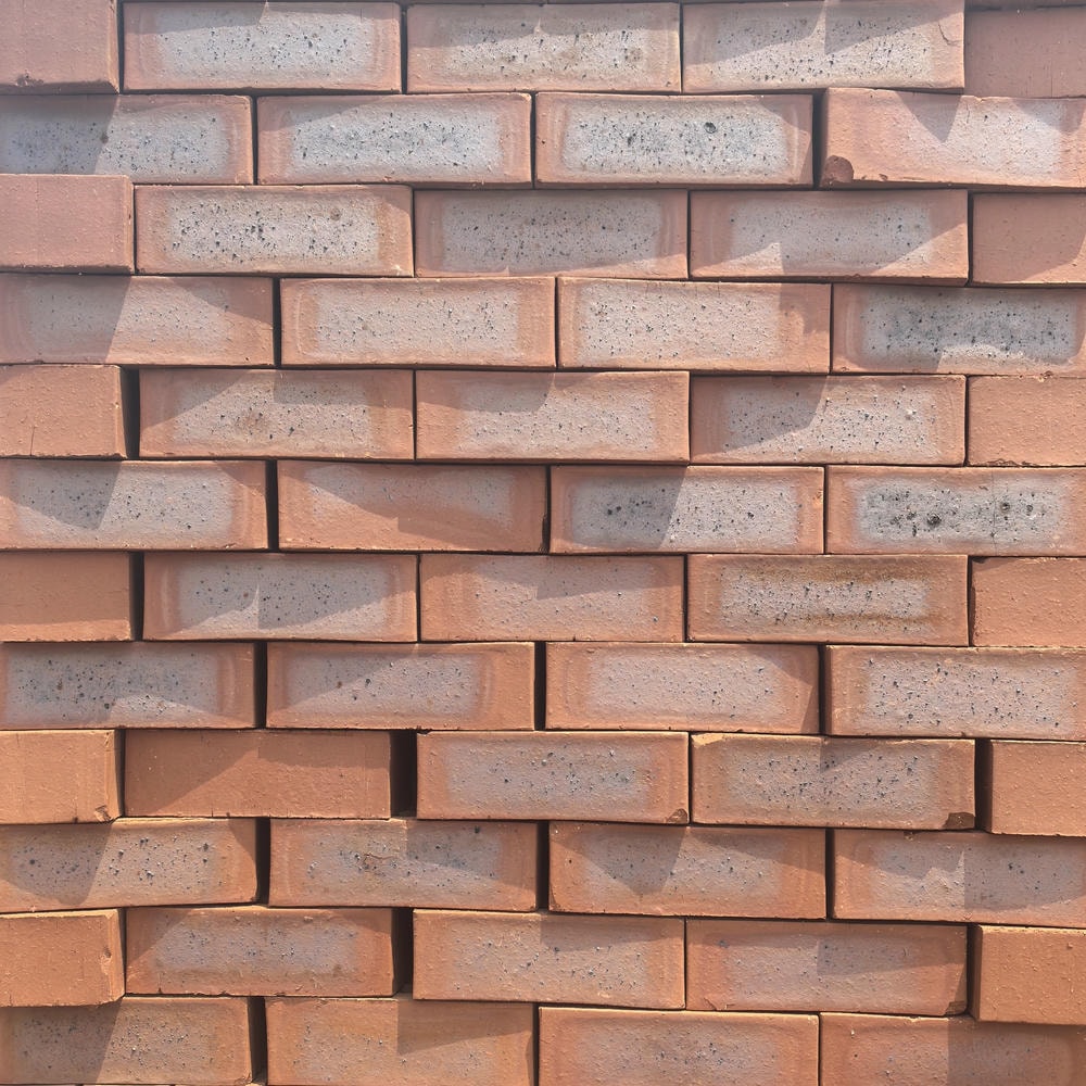 Country Classic Satin Face Brick featuring a traditional multi-tonal red blend and a smooth, low-sheen satin finish for timeless architecture.