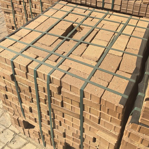 Cederburg Dark Unique Bevel Paver featuring rich mid to dark brown tones and a precise 50mm chamfered edge for durable driveways and commercial walkways.