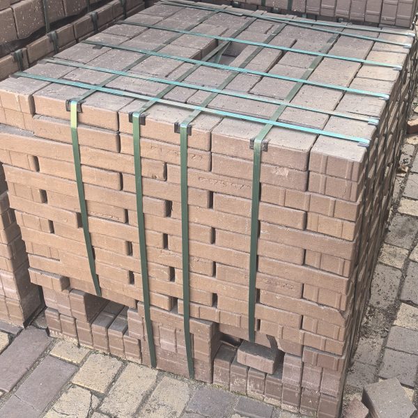 Graphite Bevel Paver featuring sleek mid-grey clay tones and a precise 50mm chamfered edge for modern driveways and commercial paving projects.