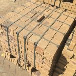 Namaqua Stone Bevel Paver featuring mid-brown tones with characteristic black spots and a precise 50mm chamfered edge for residential and commercial paving.