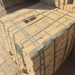 Namaqua Stone Variation Straight Edge Paver featuring vibrant yellow tones with a unique blue-burnt flash and a flush 50mm straight-edge finish for modern paving projects.