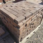 Nutmeg 65mm Bevel Paver featuring a robust dark brown clay profile and a thick chamfered edge for heavy-duty driveways and commercial paving projects.