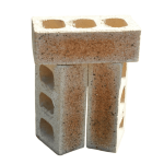 Three Sunrise Travertine clay face bricks arranged vertically on an isolated background showing core hole perforations, pitted travertine texture, and warm apricot-tan face tones.