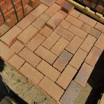 Mid Red Tuscan Blend Clay Bevel Paver featuring uniform sizing with subtle reddish color variations for light to medium traffic residential and commercial paving.